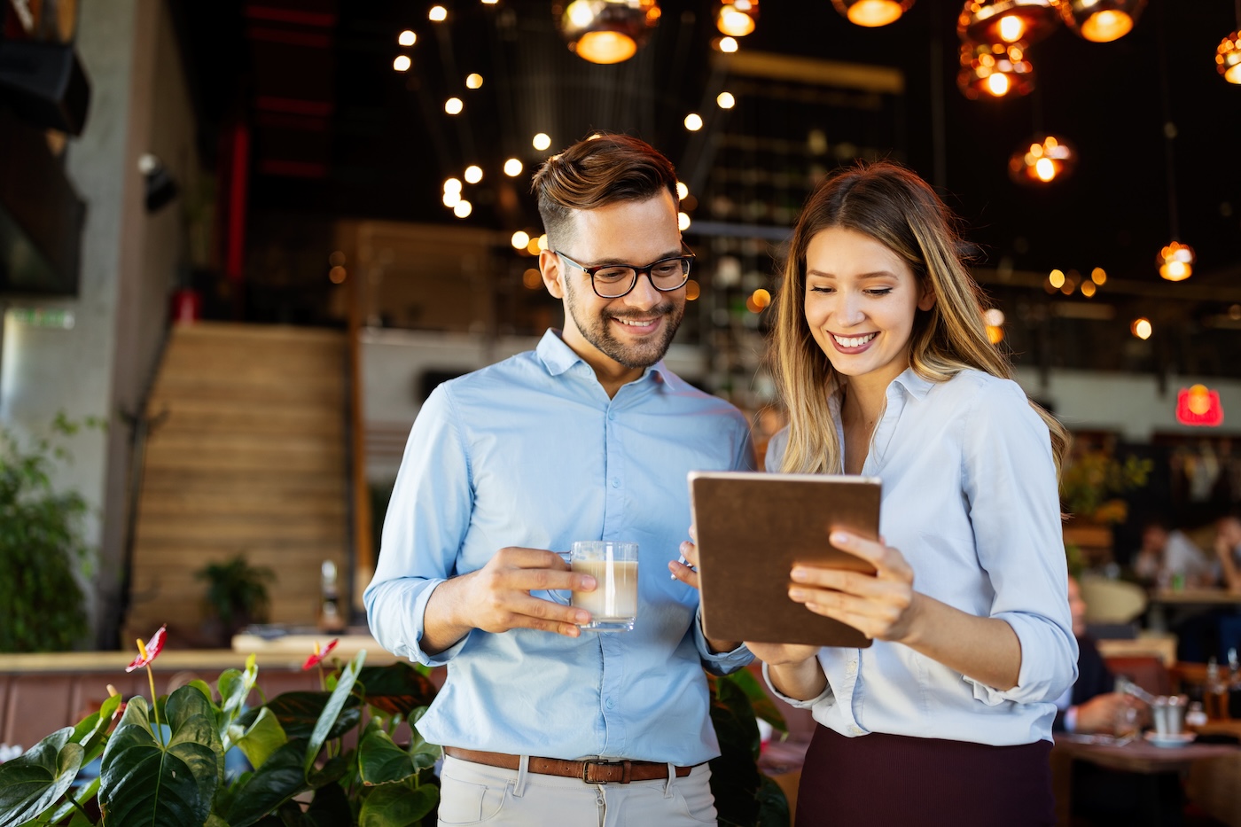 Successful company with happy business employees in modern office