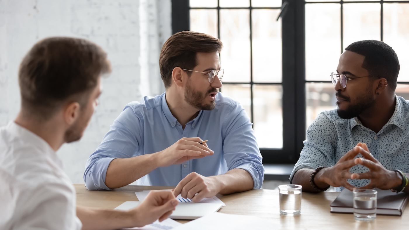 Diverse team discussing project strategy, sales and marketing reports on corporate meeting in office. Male leader and his group talking and brainstorming together. Coach training multiethnic employees SSUCv3H4sIAAAAAAAACpxTy2rkMBC8L+w/DDpHoKcl5VeWPejlGRGPFWQ5IYT8e9rPaPa4GIy7Wl1dXWp//v51uSBnp+TR8+VziSBOwzBPtdia8ggwedrxEscQS4u8Fd6RFogh1VySHVrQ2epvo71HAMd5GBb4a02iqdo6T3Fauu+QtzVegWMDT4pN4p8tvhyJNQkVkELoqcGm2a3YAW3k/1W5ffw9prHXOPqPH20AhRLtfappnfCUCAklH6gpYw+xMmeXg35pMNj7xz9ED2WdY0byoDDTmmFBpMGOcIMDUyZoTil34Yd4+1in2B0ucYh2M33vgaTi2hjhcdCRYKECwTYEg3XUXLioteP00ICYC4701GABKXiFgK2THnciUskik6GL52FJmded0pixzoFY7UGsUDhyz4XpmbFcrmI3B9DLe43l3i6EnUPKzS68ZW+H5QBvZnotyafx2pTleluX9SjzeR5rWYw93URDzq/WDcu19cAZD/xmpwmOhwNvGnn4NfK96TPmulq5s6IA+7uElLOOE6UMFwweTva733f+loBnlXMQQexfUmhHT4sC5B3vBZUELLQKC+87uBxGMaVWSdOD7YaBhV/fAAAA//8DANgeqNnOAwAA